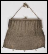 A pair of vintage ladies early 20th century Art Deco chain mail handbags, the first being silver