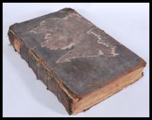 An 18th century George the III 1765 bible of Reverend Samuel Smith, leather bound with multiple