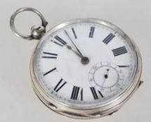 A silver hallmarked pocket watch having a white enamel face with Roman numeral chapter ring and