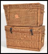 A pair of large early 20th century possibly military / laundry wicker basket /baskets. One with