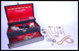 A collection of vintage 20th century costume jewellery to include a monet gold chain, a cameo brooch