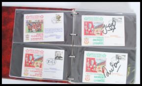 A collection of over 100 Liverpool football club postal covers across three albums dating from