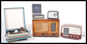 A collection of vintage 20th century retro music players to include, a Dansette gem radio, a HMV