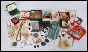 A collection 20th century of costume jewellery to include a collection of real pearls, a vintage