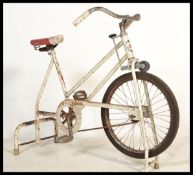 A stunning vintage mid 20th Century Columbia tubular frame mid 20th Century exercise bike in full