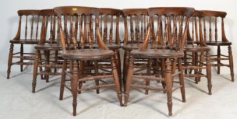 A long run /  set of 12 19th century Victorian Windsor elm and beech stick back dining chairs having