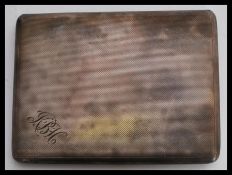 A vintage mid 20th century silver hallmarked cigarette case by D Bros having a slide open mechanism.