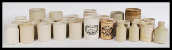 A collection of vintage 20th century ceramic advertising point of sale jam jars many having the W.P.