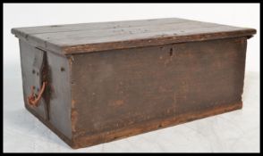 A vintage early 20th century pine blanket box storage coffer chest having a brass lock to front