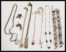 A group of sterling silver jewellery to include an ingot pendant necklace, Cleopatra style necklace,