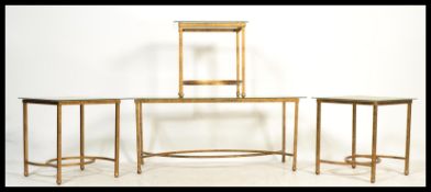 A retro 20th Century gilt metal framed rectangular coffee table raised on column supports united