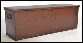 A 19th century pine wooden blanket box chest with  swing handles to the sides, and a W. S.