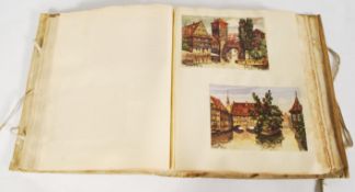 A 20th century vellum covered postcard album with ecclesiastical images from 1930, vintage postcards
