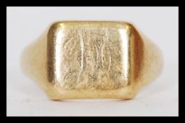 A 20th century 9ct gold hallmarked Birmingham cushion shaped signet ring weighing 9.9 grams,size