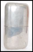 An over sized 20th century silver plated hip flask with a screw top. Measures: 20.5cm high x 11cm