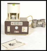 A vintage retro Dental Eurotherm Docx Automatic MK II ceramic dental furnace together with