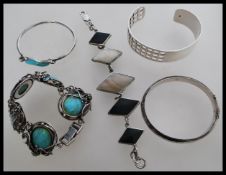 A collection of silver ladies jewellery to include a 925 silver bangle with square cut out
