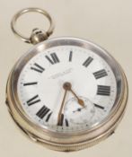 A silver hallmarked large pocket watch having a white enamel face with Roman numeral chapter ring