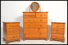 An antique style country pine bedroom suite consisting of a pine two over three chest / bank of