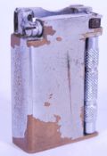 A vintage 20th century Dupont petrol lighter no816155 of typical form having engine turned