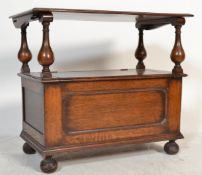 A mid Century Jacobean revival  dark oak monks bench - hall settle with hinged seat enclosing