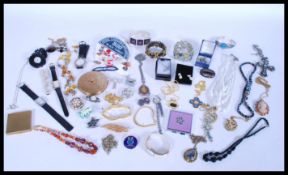A box of costume jewellery to include a large cameo portrait pendant, a selection of six watches,