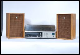 A retro 20th Century Sanyo Stereo Music System Model GXT 4520 KL, having tape p[layer / recorder,