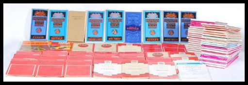 A large collection of vintage early 20th century ordnance and survey maps to include early canvas