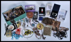 A collection of vintage 20th century costume jewellery to include a 1/3 9ct gold bangle, a