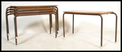 A set of five vintage 20th Century tubular children's stacking desks/ tables. Each table / desk