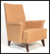 A mid century retro, circa 1950's armchair being r