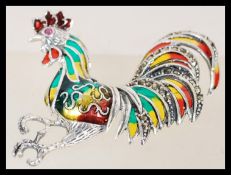 A vintage 20th century plique a jour cockerel brooch  having a hing pin fastening.