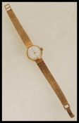 A vintage 20th century Mappin hallmarked 9ct gold ladies watch with bark effect bracelet, and