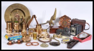 A collectors lot of mixed 20th century items to include a brass bird ornament, a cuckoo clock, a