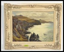 A 19th Century English school oil on canvas of a coastal scene with waves crashing on the shoreline,