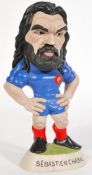 A vintage World of Groggs figurine of French Rugby player Sebastien Chabal. Signed to base and