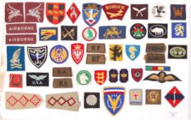 COLLECTION OF BRITISH MILITARY CLOTH FORMATION PAT