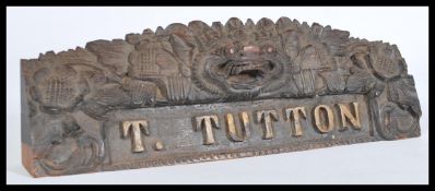 A 19th century Burmese name plaque with inscriptio