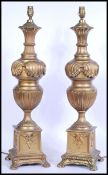 A large pair of vintage 20th century gilt ormolu bronze table lamps raised on square bases with