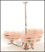 A retro mid 20th Century three point angular / atomic chrome chandelier / light fixture in the