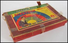 A vintage 20th century Meccano Elektron Electrical Experiments toy set, boxed with instructions.