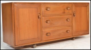 Ercol - Windsor - A 1960's retro vintage blonde beech and elm sideboard comprising of an arrangement