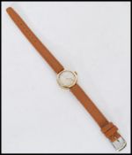 A vintage early 20th century Bentina 9ct gold ladies cocktail dress watch having an octagonal case