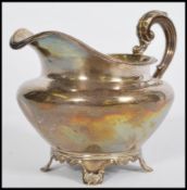 A 19th Century Georgian silver hallmarked sauceboat, Charles Fox II, London 1836, of traditional