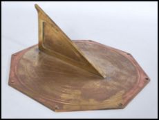 A 19th century Victorian heavy copper and brass sundial of square form having a Roman numeral