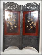 A 19th century Victorian folding Chinese / Asiatic screen having ebonised wooden frame inset with