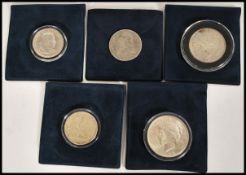 A collection of American commemorative coins to include a 1942 half dollar, a Philippines 1907 US