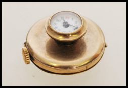 An early 20th century stamped 9ct gold button hole watch having Arabic numerals to the chapter