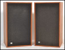 A vintage 20th century teak cased record player music cabinet having a Garrard AP76 deck with a