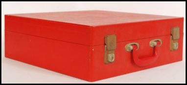 A vintage retro 20th century portable picnic set by Sirram complete in red vinyl case with
